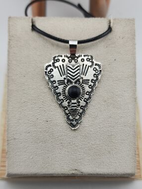 Intricate Silver-Tone Arrowhead Pendant Necklace with Black Accent